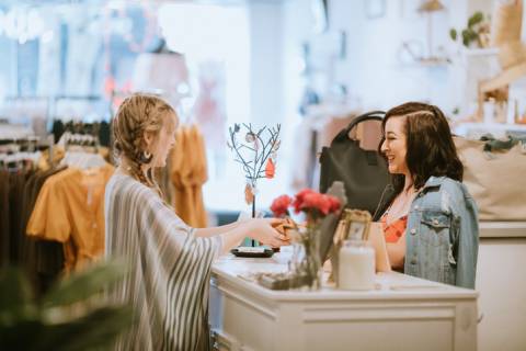 A woman shops in a Rockport boutique